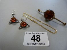 A pair of silver earrings, brooch and a 9ct chain