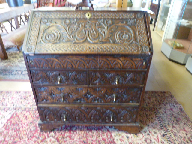 A dark oak bureau with carved decoration - Image 3 of 10