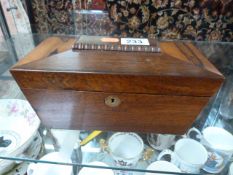 A Victorian rosewood tea caddy