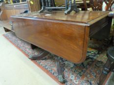 Early Victorian sofa style table on claw and ball casters