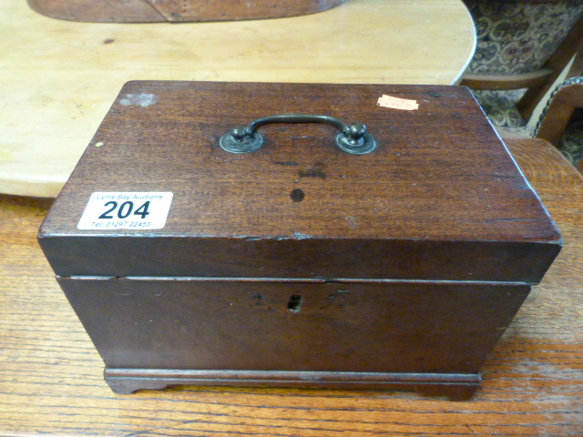 A Mahogany tea caddy