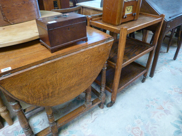 Oak drop leaf table and an oak tea trolley - Image 4 of 9