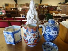 A Blanc de Chine figure (A/F) and four other pieces of oriental china