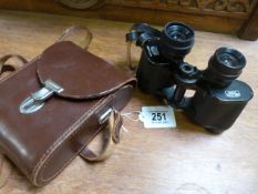A pair of Carl Zeiss Jenoptem 8 X 30 binoculars in leather case
