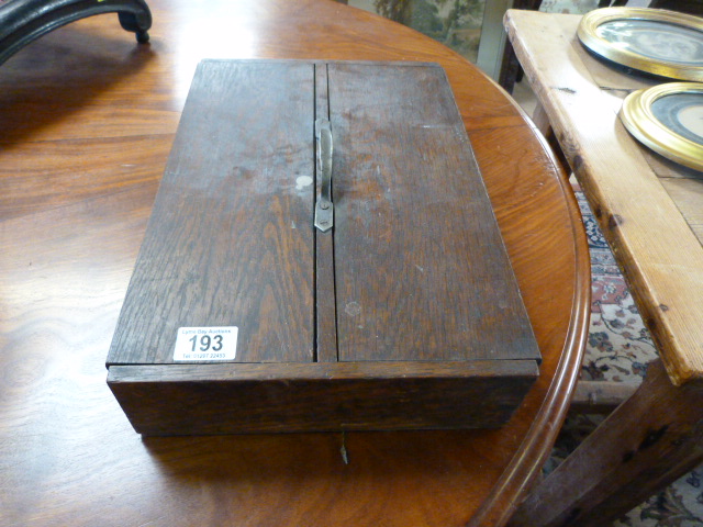 An oak cutlery tray