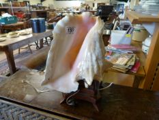 A Conch shell table lamp