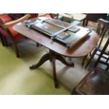 An elm rectangular tripod table with Gothic influence