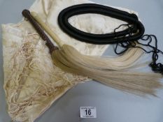 Traditional Agal headdress and two horse hair fly whisks