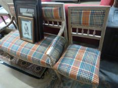 An upholstered bench and matching chair