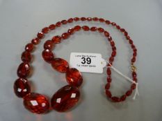 An amber necklace with faceted decoration