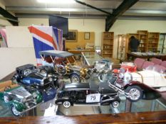 A quantity of vintage model cars, including Mercedes, Bugatti etc.