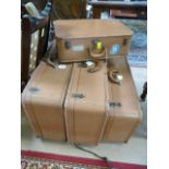 A Set of four vintage suitcases