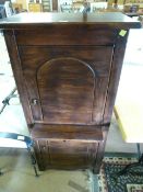 Oak display cabinet with cupboard over and chopping board