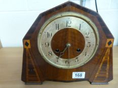 A wooden mantle clock