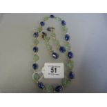 Necklace and earring set, cabochon Sapphire,sculptured Emeralds in the form of leaves and Diamonds
