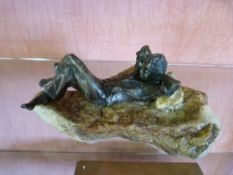 Bronze Style man on a stone base