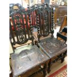 A Pair of carved hall chairs on Barley twist legs and one similar