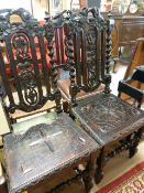 A Pair of carved hall chairs on Barley twist legs and one similar