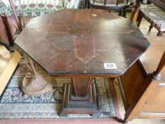 An inlaid coffee table with square tapering base