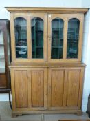 A Pine dresser with display cabinet over