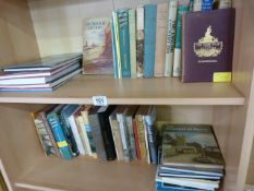 Quantity of local Topography books on two shelves