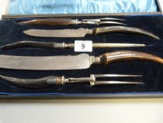 A cased silver mounted carving set with horn handles- case A/F