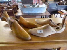 Pair of vintage shoe stretchers and one other