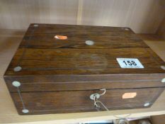 A Victorian rose wood tea caddy