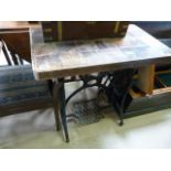 An occasional table repurposed from a treadle sewing machine