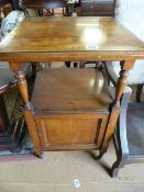 Mahogany centre table with cupboard under