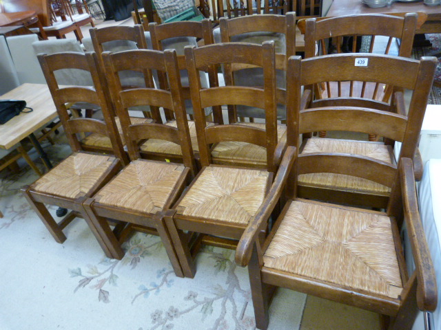 A Set of eight oak farm house chairs