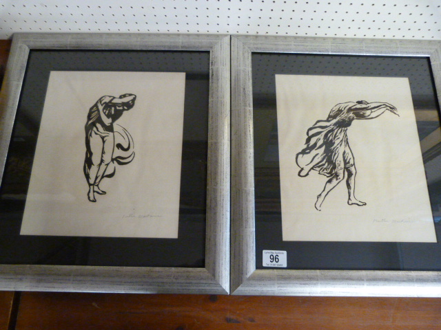 A pair of wood block style pictures of ladies