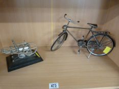 Model of a stationary engine and a scale bicycle