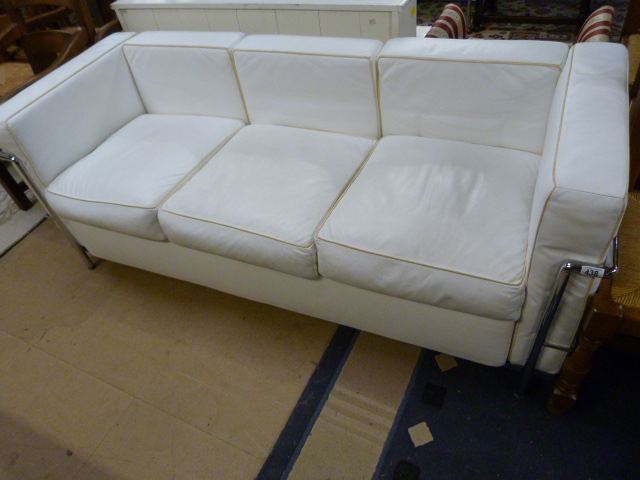 A White leather and chrome sofa