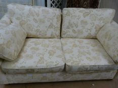 A Cream Two seater sofa