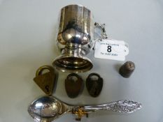 A hallmarked silver spoon, a plated Christening mug , thimble etc.