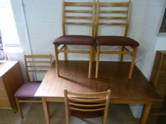Teak extending table with four chairs