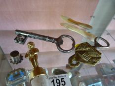 Large key, bottle opener etc