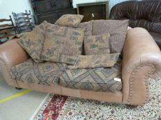 Thomas LLoyd tan leather and fabric sofa