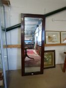 A Victorian mahogany single door wardrobe