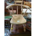 A childs small pine chair