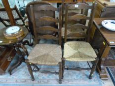 Three rush seated ladderback chairs