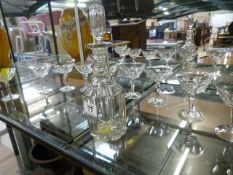 A Cut glass decanter and cocktail glass part set