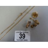 A 9 ct gold chain ( weight 3.4g) a fine chain,a pair of earrings, an 18ct gold stud (2.1g) and