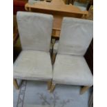 Set of four leather dining chairs