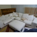 A Very large cream upholstered corner sofa