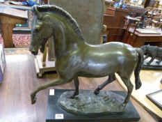 Large bronze of a horse on plinth