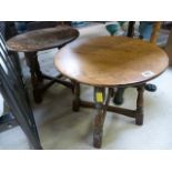 Two small round oak coffee tables