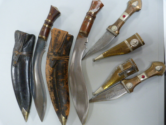 2 Kukri ( missing smaller knives) and two other Arabian knives