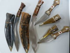 2 Kukri ( missing smaller knives) and two other Arabian knives